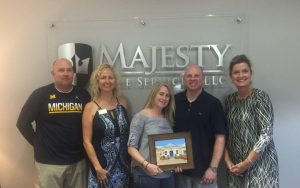 The New Legacy Homes team with happy new homeowners